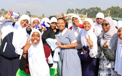 Millicent Omanga with students from Ainsworth Primary School