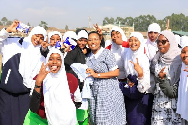 Millicent Omanga with students from Ainsworth Primary School