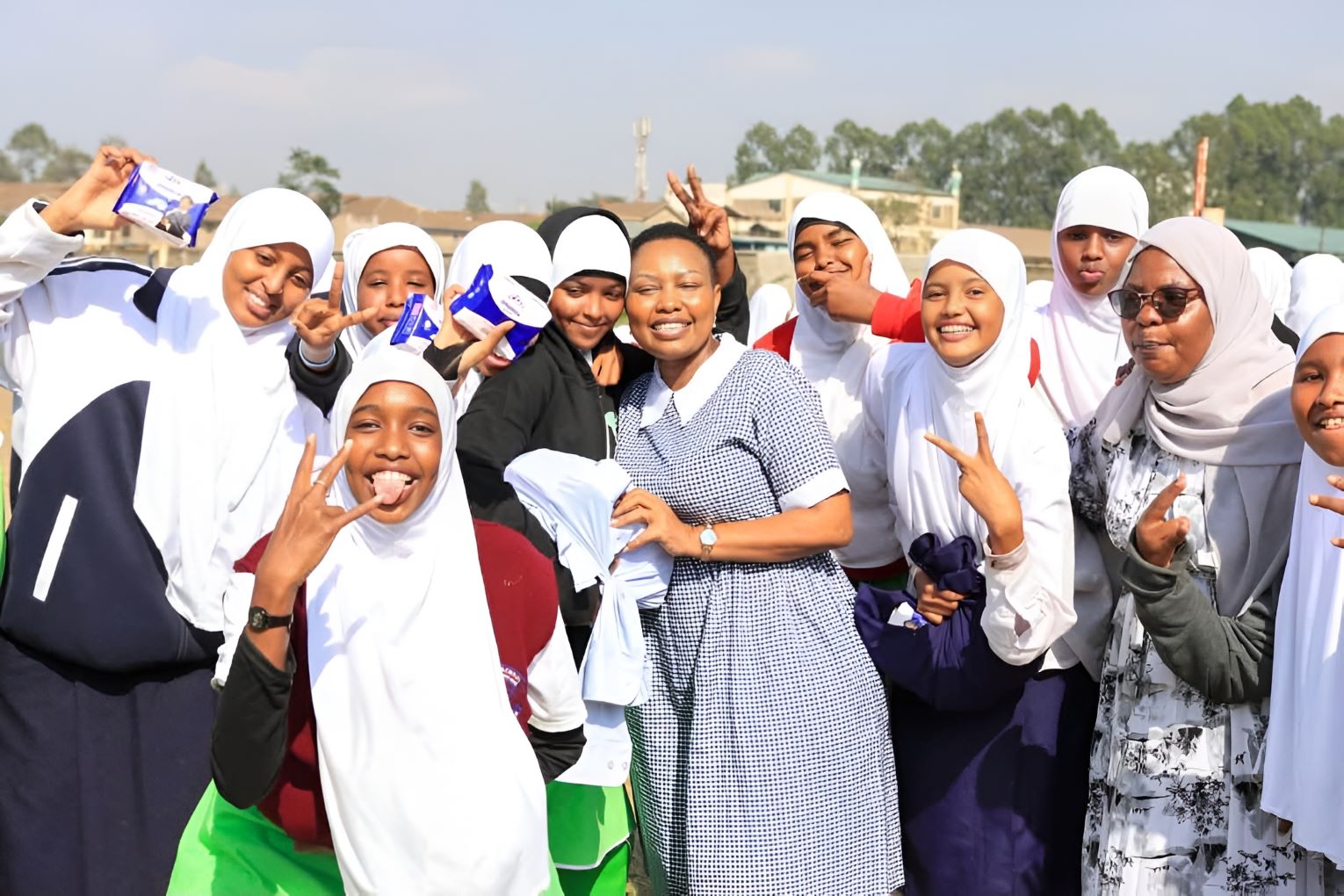 Millicent Omanga with students from Ainsworth Primary School