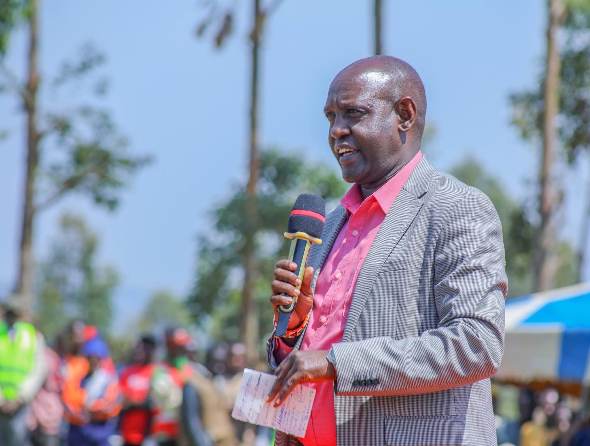 Principal Secretary for Basic Education John Olotuaa speaking during the launch of new classrooms at Hema Chitago Senior and Comprehensive Schools