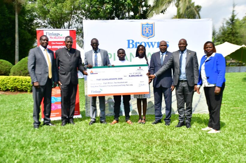 Representatives from Browns Plantations Kenya and the Browns and Finlays Community Trust present a dummy cheque for TVET scholarships to the 2026 cohort of 39 beneficiaries from Kericho and Bomet counties
