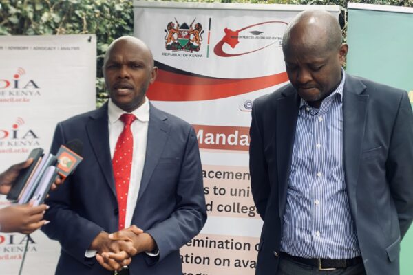 Acting CEO university fund Dr. Edwin Wanyonyi and HELB CEO Mr.Geoffrey Monari addresssing the press in Naivasha