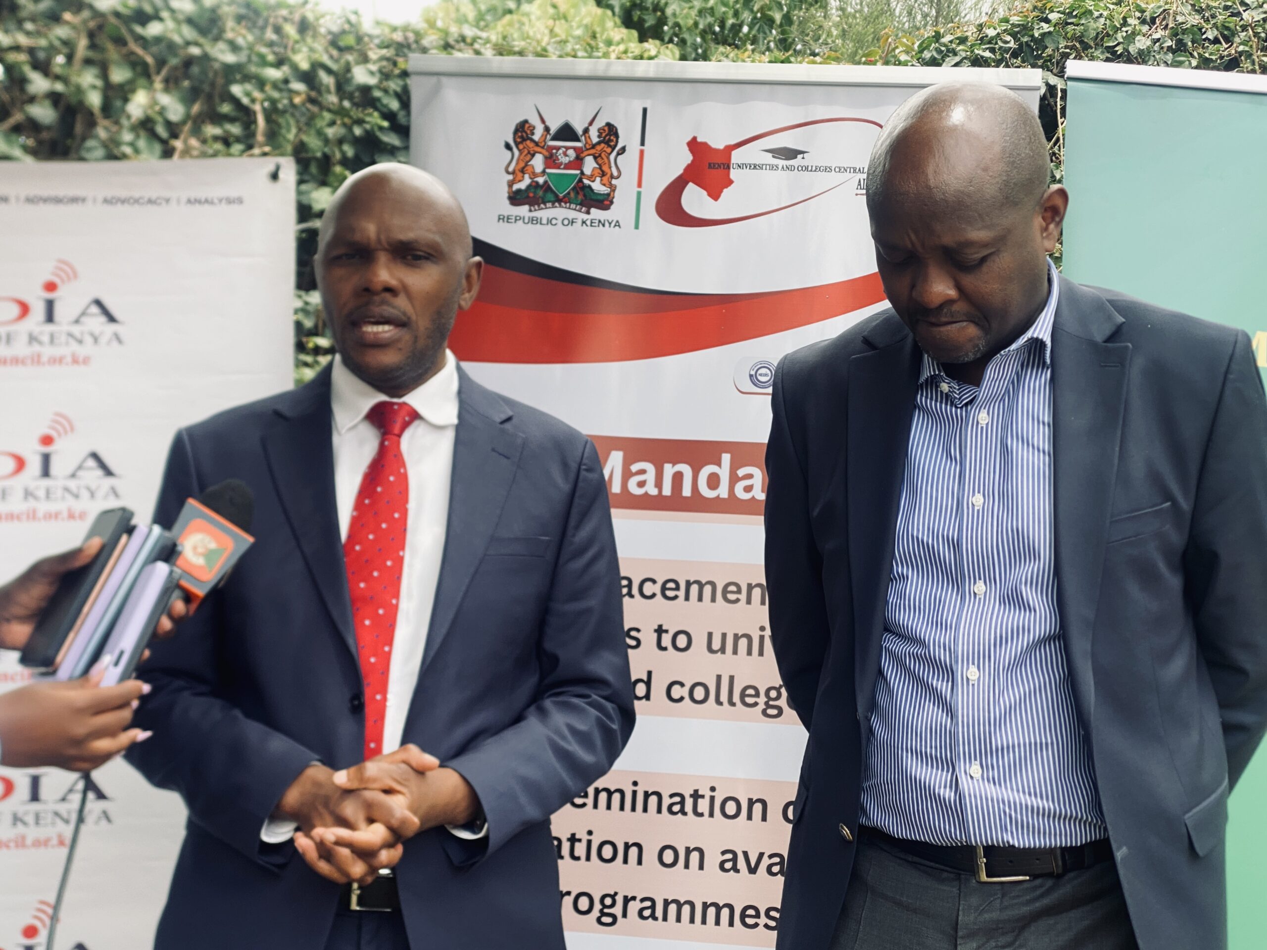 Acting CEO university fund Dr. Edwin Wanyonyi and HELB CEO Mr.Geoffrey Monari addresssing the press in Naivasha