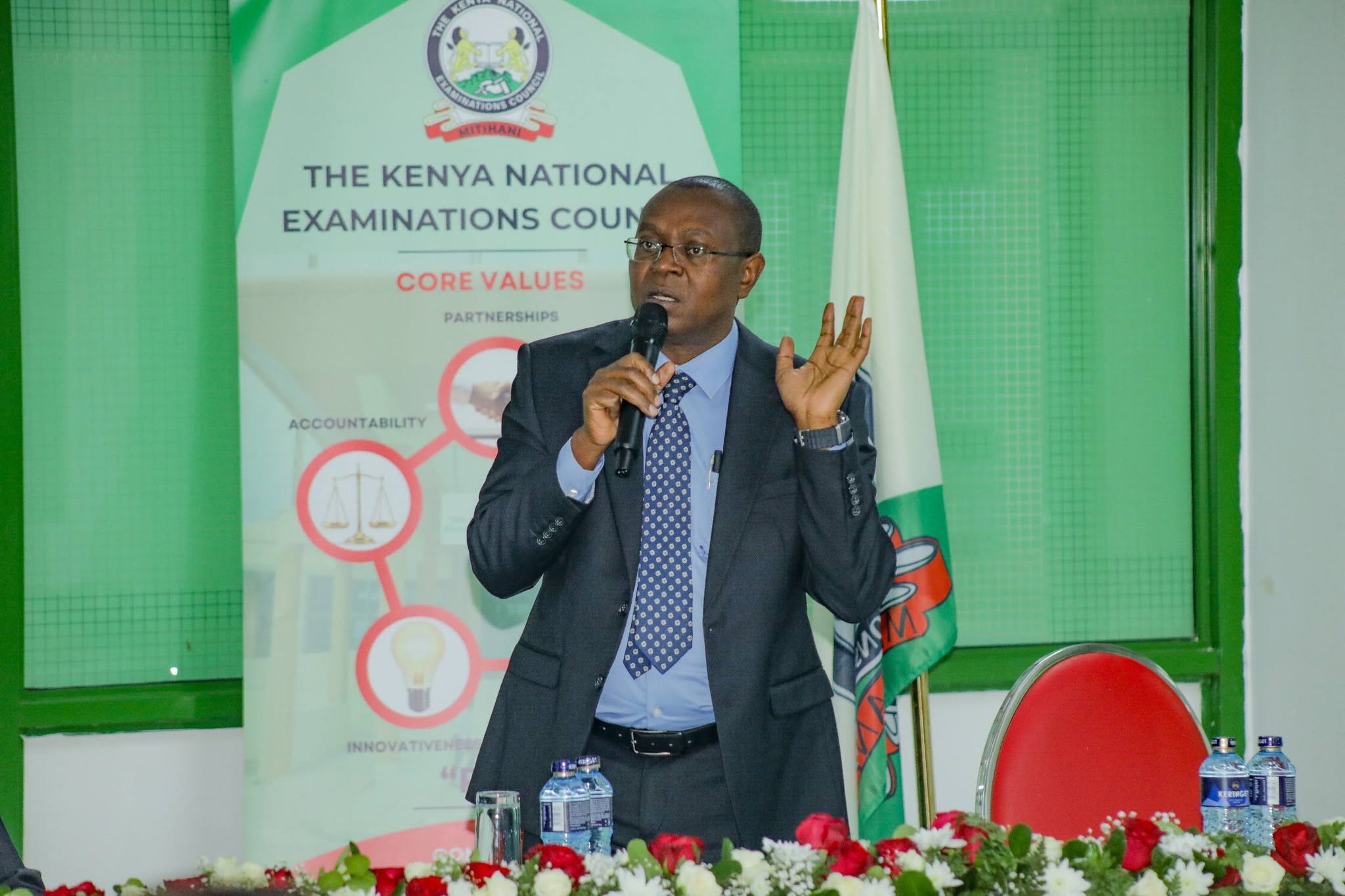 KNEC CEO Dr David Njeng'ere speaking during the meeting
