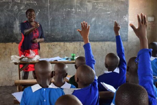 A teacher teaching students in class