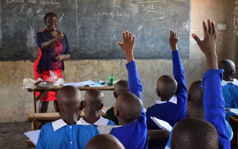 A teacher teaching students in class