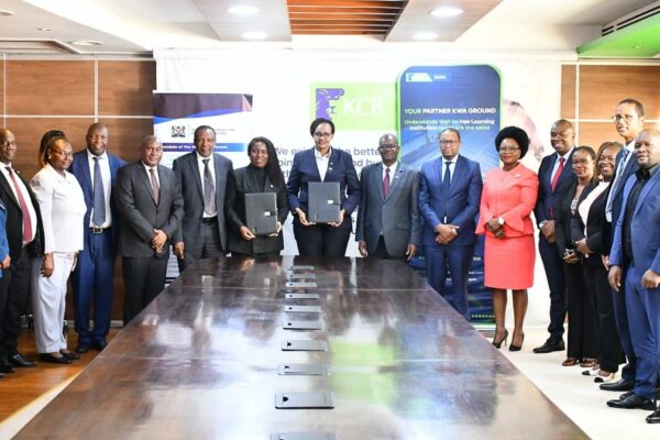 Principal Secretary Higher Education and Research, Dr. Beatrice Muganda Inyangala and other stakeholders during the signing of the MoU with KCB
