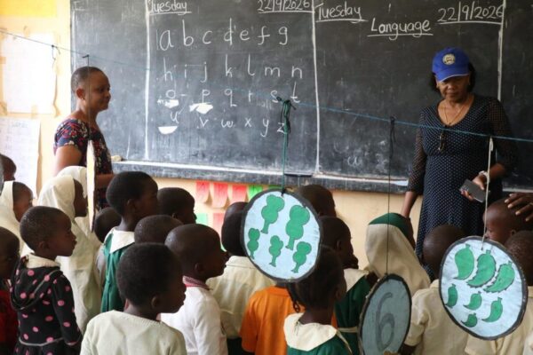 Senate Education Committee Chairperson Betty Montet(right) interacts with pupils during an inspection of an ECDE centre in Kilifi County on Tuesday, September 22, 2026