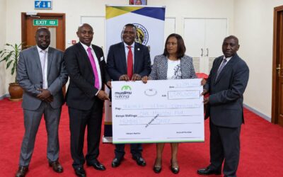 Mwalimu National DT SACCO officials led by National Chairman Joel Gachari and CEO Kenneth Odhiambo hand over a Sh1.5 million sponsorship cheque to TSC Chairman Dr Jamleck Muturi and Acting Commission Secretary and CEO Eveleen Mitei to support this year’s World Teachers’ Day celebrations