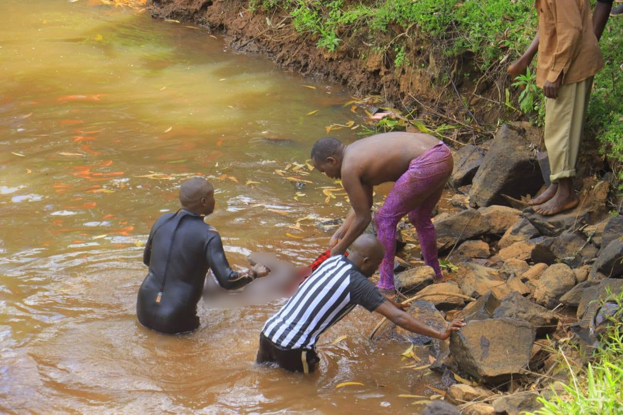 Bomet County disaster response divers retrieve the body of a Form Three student of Riokindo Boys High School from Nyakwana Falls in Kisii County during a recovery operation