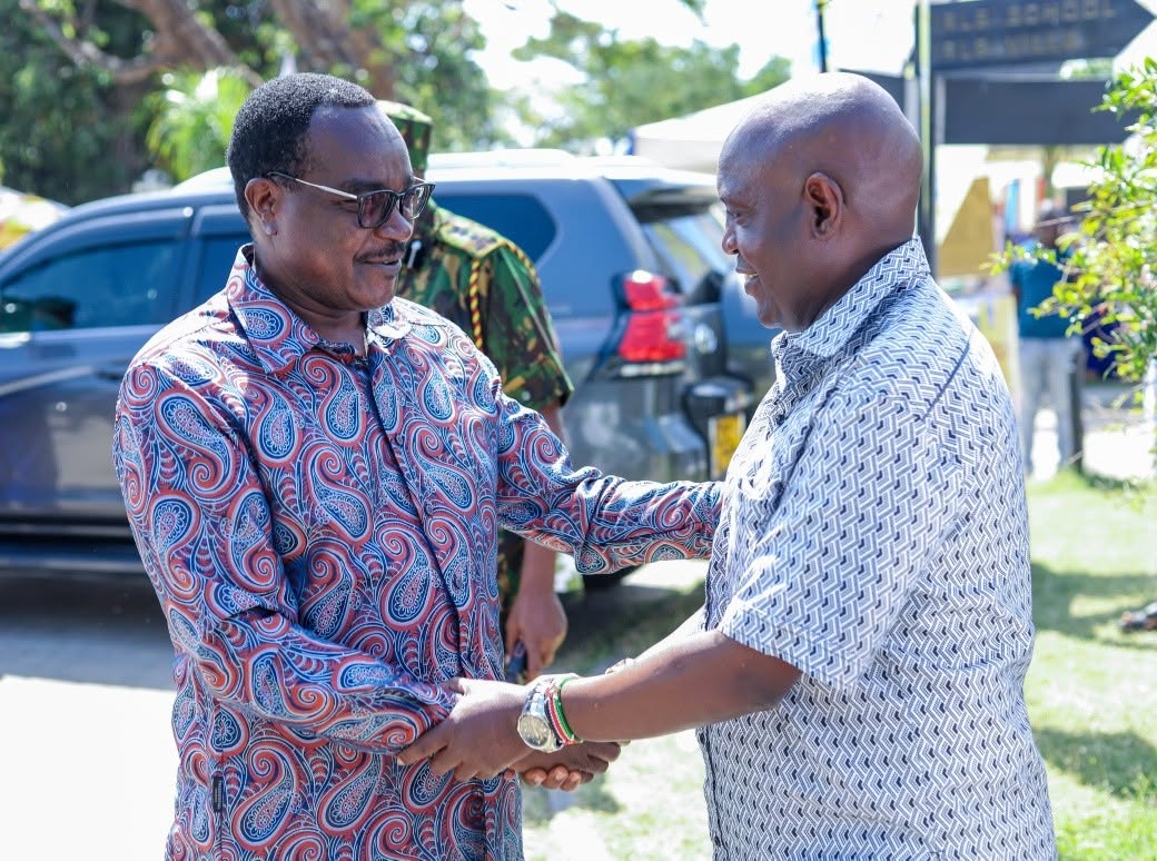 Cabinet Secretary for Education Julius Ogamba and the Principal Secretary in the State Department for Basic Education John Ololtuaa
