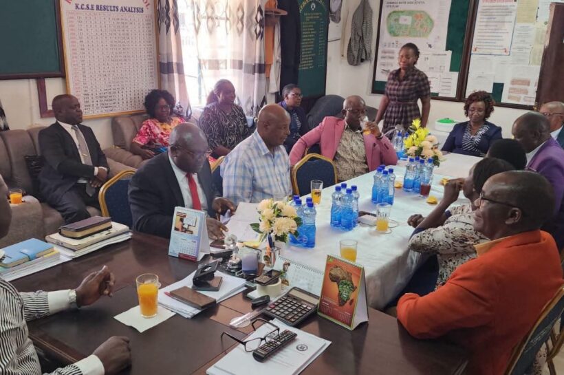 Chief Principal Clement Myang'acha( front right,) at his Kebirigo Senior School office with Principals from Nyamache Subcounty