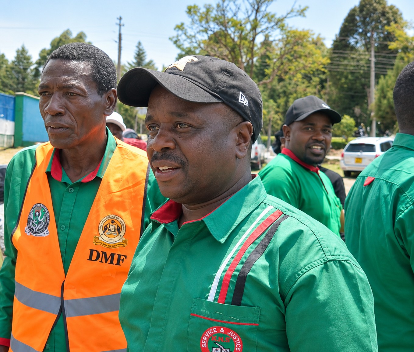 KNUT Secretary-General Collins Oyuu (left) with Bomet Branch Assistant Executive Secretary Geoffrey Bett (right) at Bomet Green Stadium recently