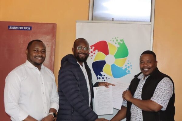 Patrick Nzomo from Strathmore Law Clinic presenting Kajiado County Early Childhood Education (Amendment) Bill, 2026 to Rongai MCA Titus Matheka (r) with Richard Magana of OCTC. Photo Obegi Malack