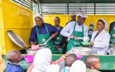 President William Ruto and Deputy President Kithuer Kindiki serve lunch to children during the opening of Dishi na County Central Kitchen on March 10, 2025